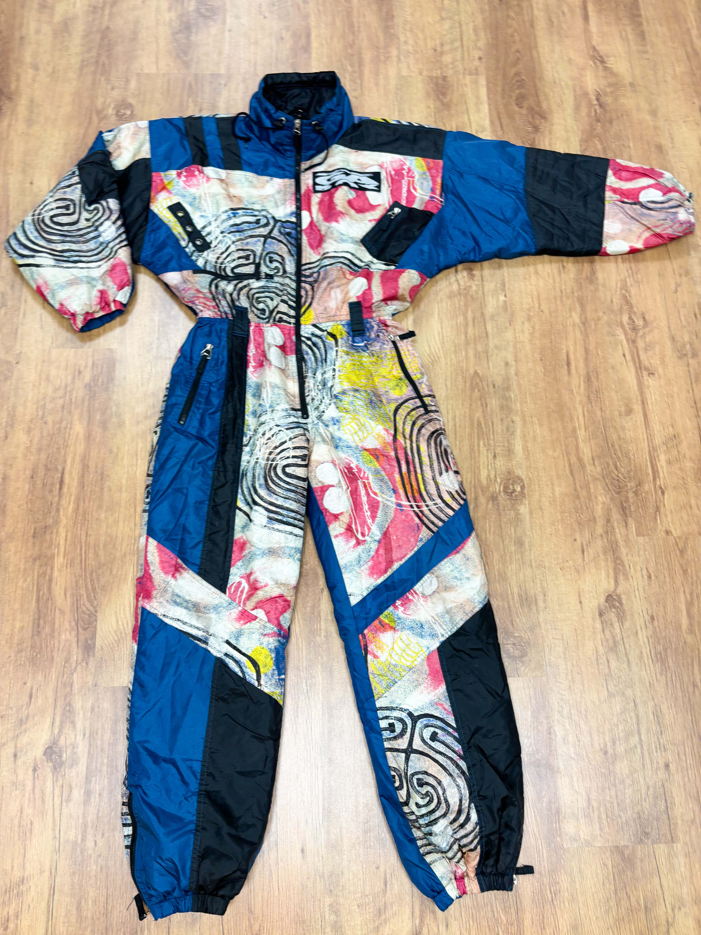 Vintage retro skipak - blauw met multicolor print maat L