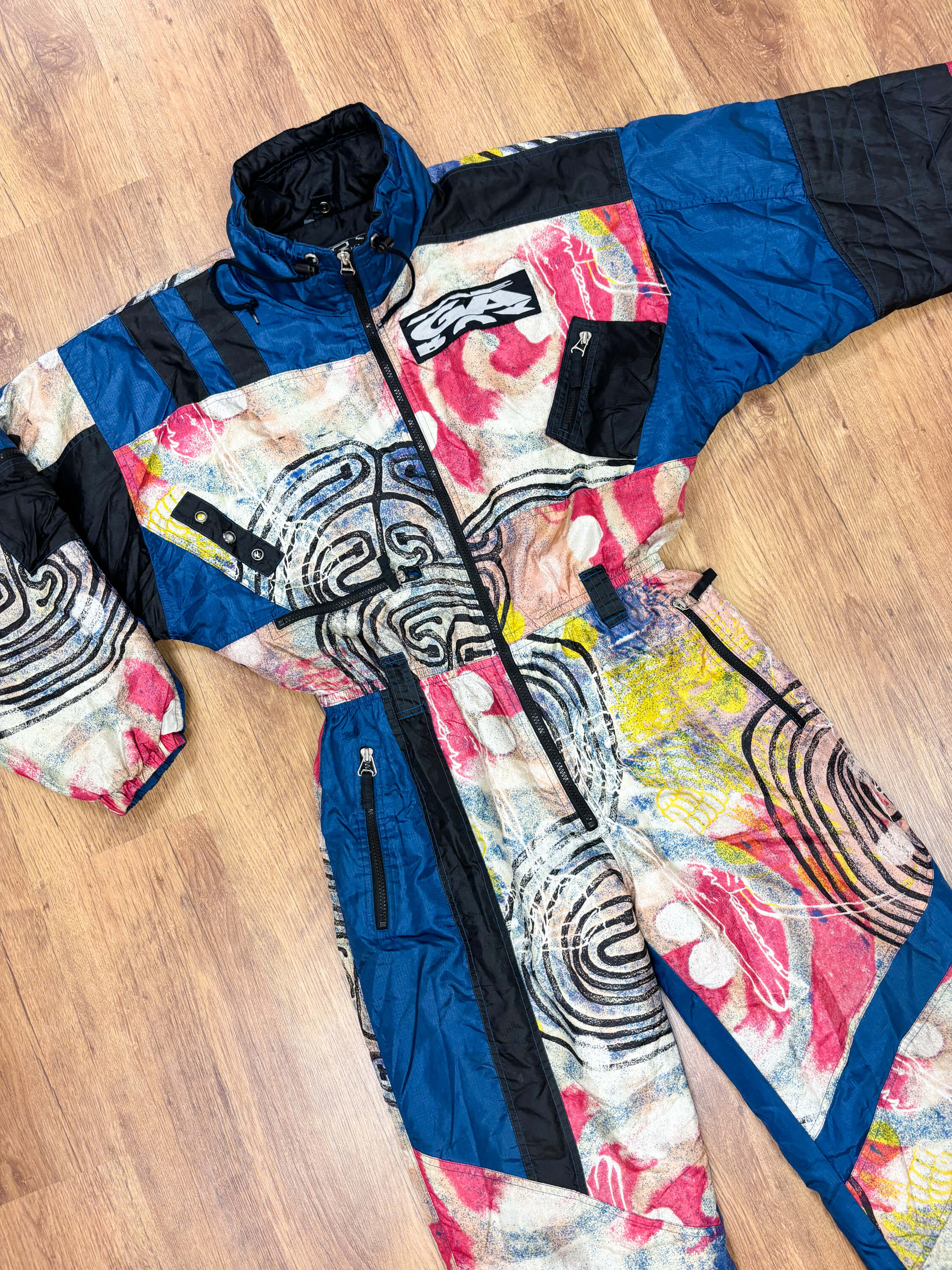 Vintage retro skipak - blauw met multicolor print maat L